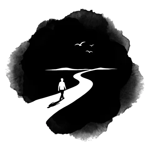Una persona camina por un camino abierto hacia el horizonte